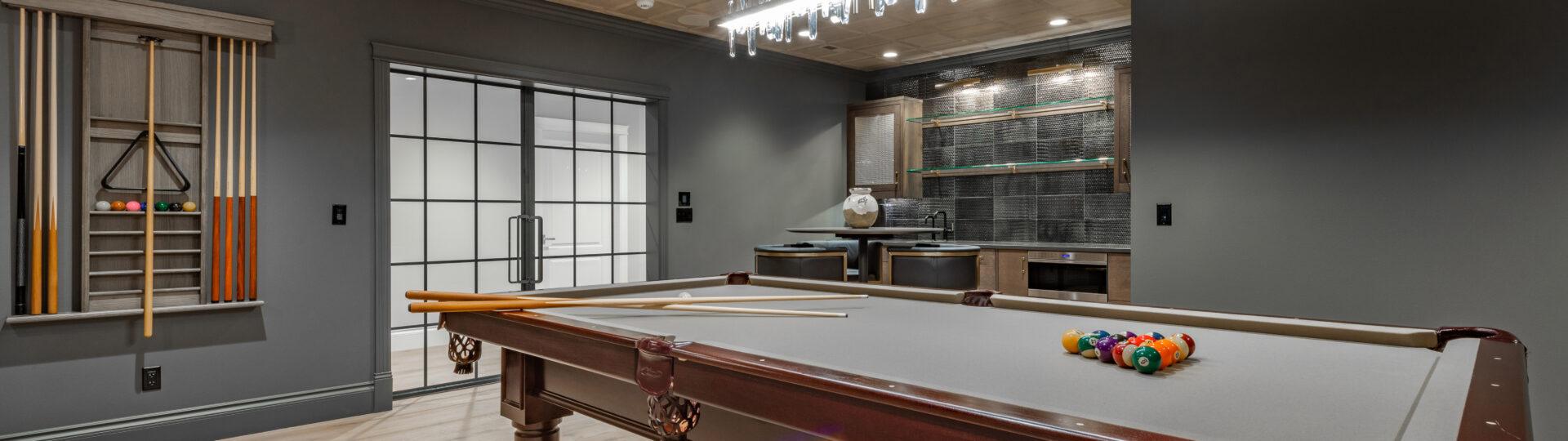 Finished basement recreation room in an Omaha home remodeled by Gottsch Construction