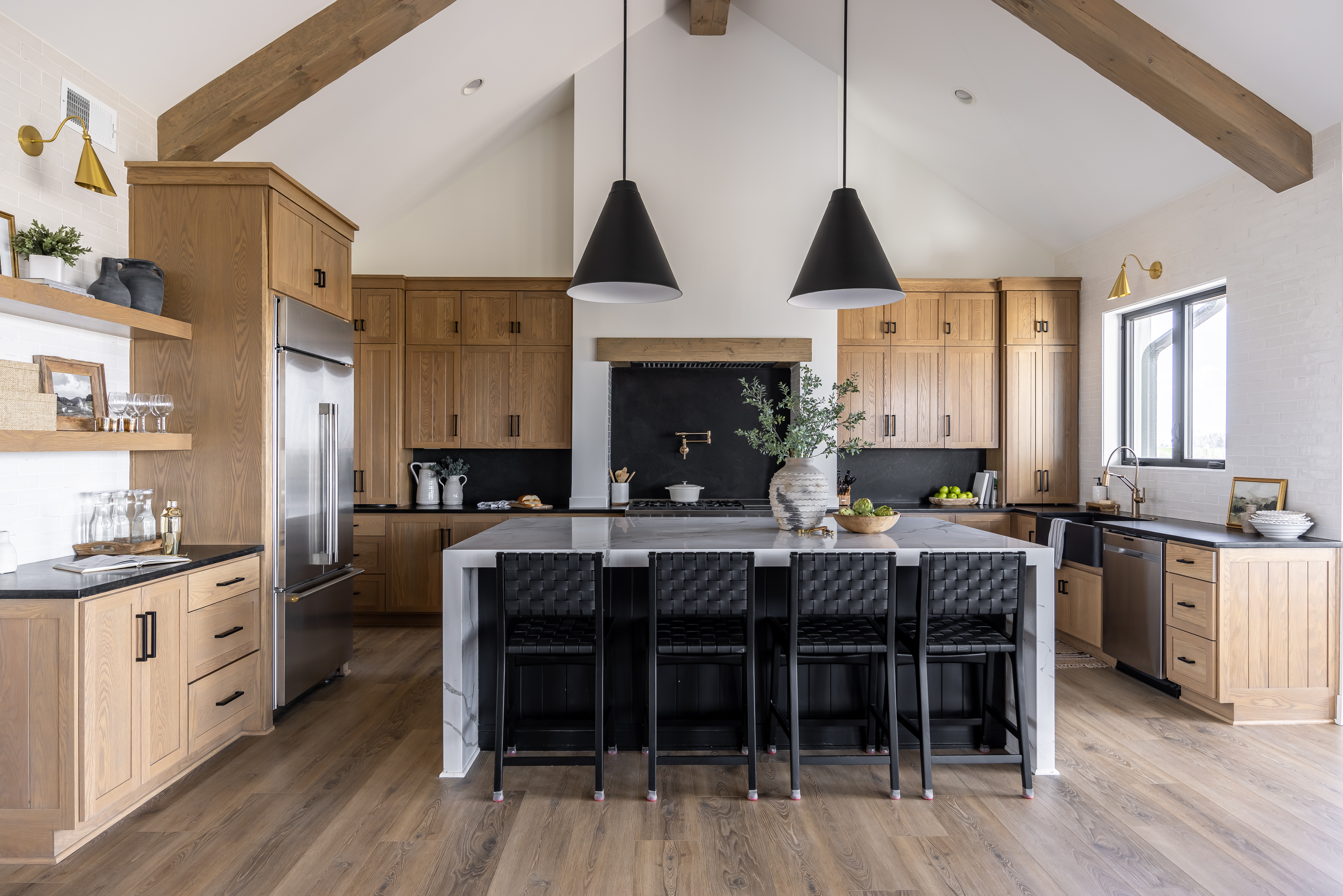 Custom kitchen with vaulted ceiling and exposed beams
